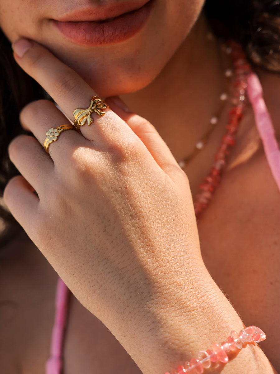 Schleifen Schmuck kombinieren: Bow-Trend 2026 modern stylen