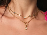 Quatre Radiant Charm Gold