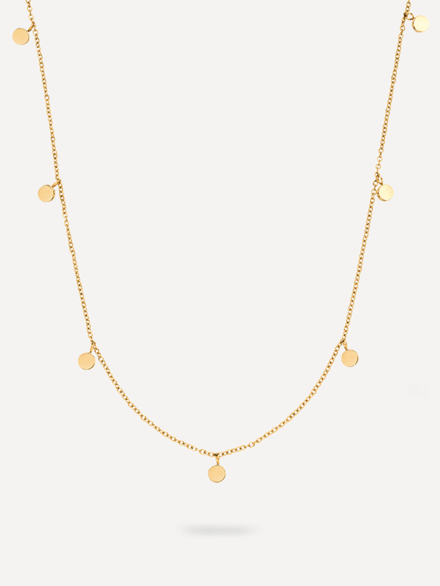 Goldene Moments Kette mit runden Plättchen auf weißem Hintergrund flach ausgelegt.